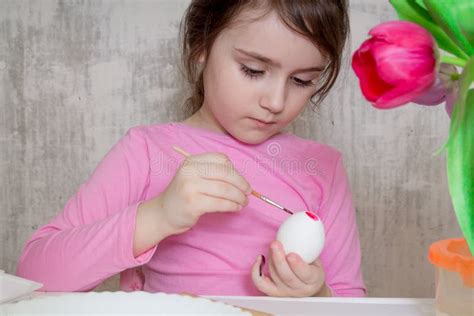 Little Girl Painting Eggs Preparing For Easter Stock Photo Image Of