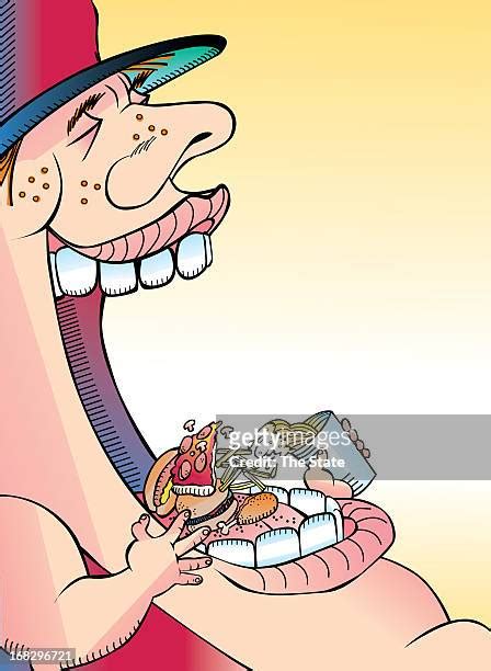 Stuffing Food In Mouth Photos And Premium High Res Pictures Getty Images