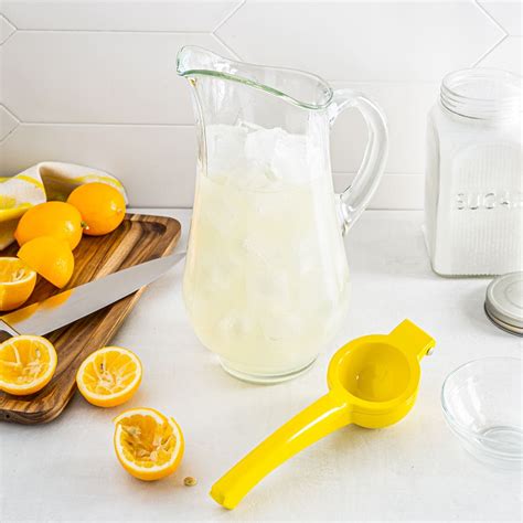 Ksp Squeeze Hand Held Lemon Juicer Yellow Kitchen Stuff Plus