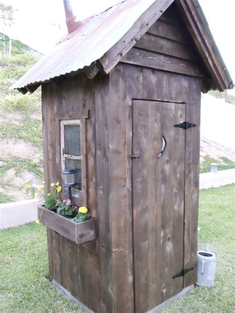 It features plenty of rustic accessories and wooden. #OutdoorShedPlans | Outhouse bathroom, Outhouse bathroom ...