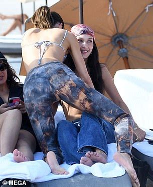 Kendall Jenner Struggles To Contain Her Perky Assets In Tiny String
