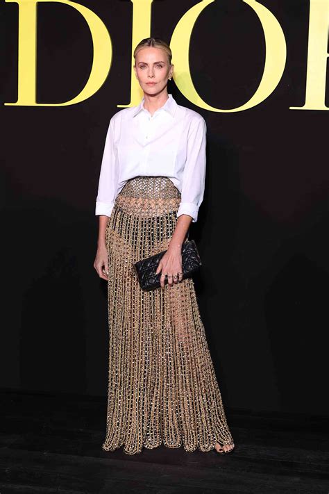 Charlize Theron Paired A Totally See Through Beaded Maxiskirt With Black Underwear And A Button Down
