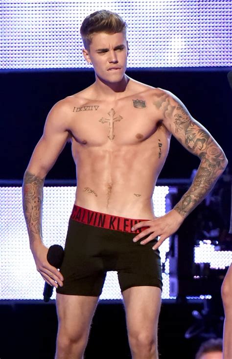 Justin Bieber Shirtless During Fashion Rocks Photos Popsugar Celebrity Photo