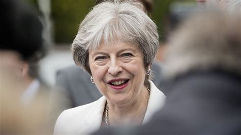 theresa may forced to deny a massive u turn over brexit following reports britain to remain in