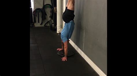 Knee Tuck Hold Handstand Youtube