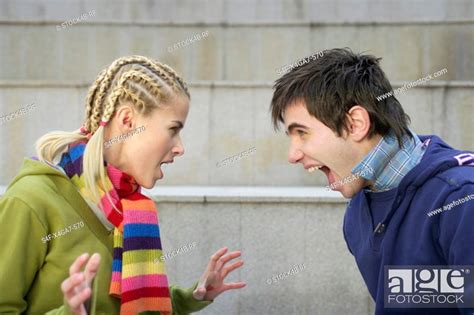 Young Couple Yelling At Each Other Stock Photo Picture And Royalty