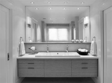 You might be wondering how a large bathroom mirror can give your bathroom a facelift. 20 Ideas of Modern Bathroom Mirrors | Mirror Ideas