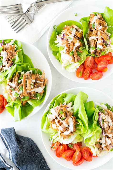 Use your slow cooker to transform lean pork tenderloin into moist and tender meat ready for shredding in this healthy bbq recipe. Barbecue Pulled Pork Lettuce Wraps with Healthy Coleslaw