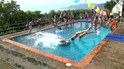 Christmas in july parties are becoming a . Christmas Pool party - YouTube