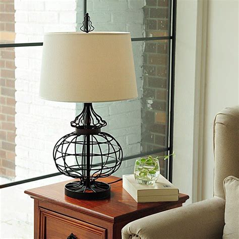 They were an essential part of every household, providing a convenient lighting solution. North America Black Color Wrought Iron Ball Art White Cloth Lampshade Table Lamp Bedroom E27 110 ...