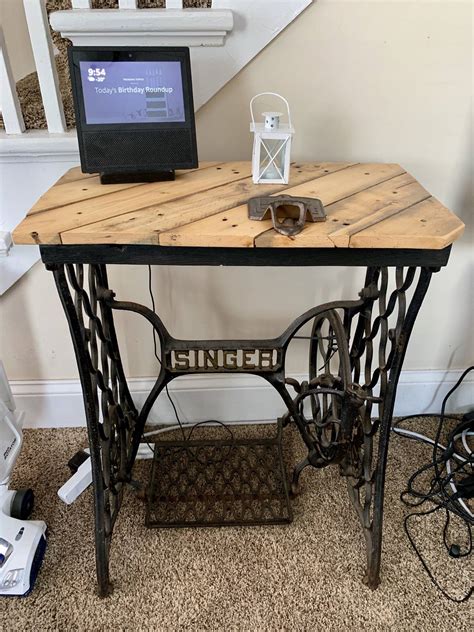 Singer Sewing Machine Base Framed With 2x4s Topped With Pallet Slats
