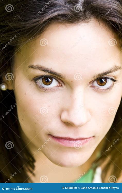 Woman Staring Intense With Angry And Defiant Eyes In Disappoint Face