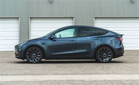 2023 Tesla Model Y Review Pricing And Specs