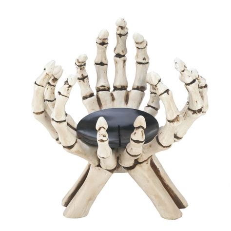 How Many Skeleton Hands Does It Take To Hold Up A Candle Three This