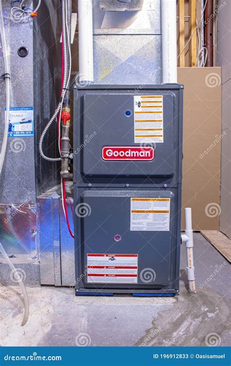 A Home Goodman High Efficiency Furnace Running During The Winter