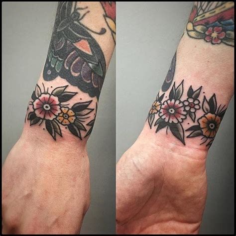 12 Classy Cuff Tattoos Cuff Tattoo Traditional Tattoo Cuff Flower