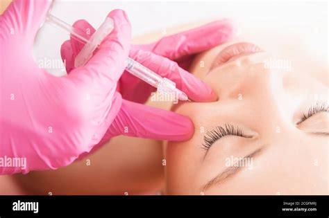 Woman Getting Rejuvenating Facial Injection Beauty And Cosmetology Procedure For Tightening And