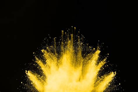 Yellow Powder Explosion On Black Background Stock Photo Image Of