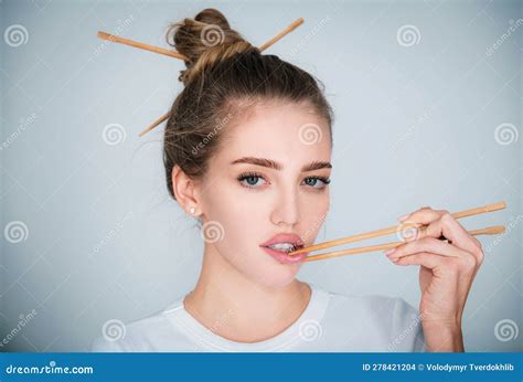 Sensual Woman Hand Holding Chopsticks Near Lips Mouth Advertising