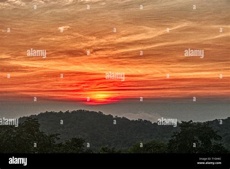 This Unique Image Shows The Beautiful Red Sunset With Great Cloud
