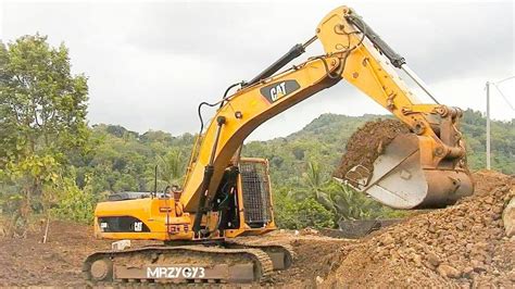 Excavators are heavy construction equipment consisting of a boom, dipper (or stick), bucket and cab on a rotating platform known as the house. Bulldozers - Newcomen.com