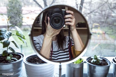 Woman Taking A Mirror Selfie Of Her Camera Free Image By