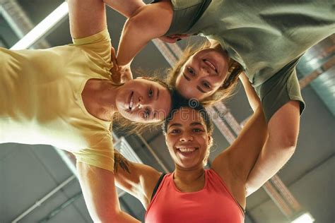 Bottom View Of Girls Hugging Each Other In Gym Stock Image Image Of
