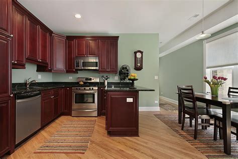 Dark wood kitchen cabinets design ideas. Light Sage Green Paint Colors In Kitchen With Dark ...