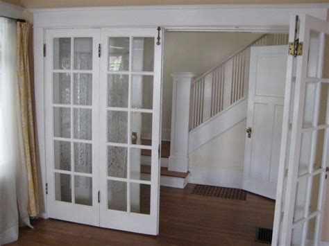 Bi-fold French Doors. Nice idea for dividing two rooms while