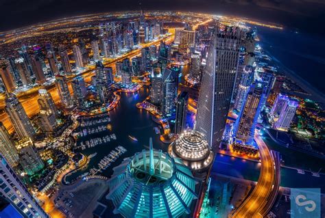 Download Light Skyscraper Cityscape Night Aerial City Man Made Dubai Hd