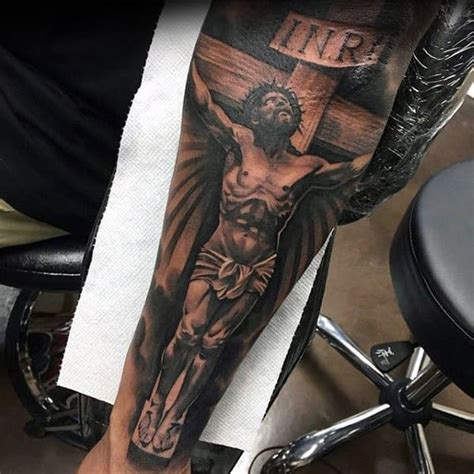 50 amazing jesus forearm tattoo designs for men [2024 guide] jesus forearm tattoo jesus on
