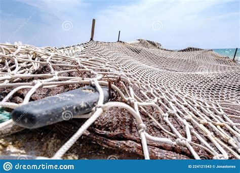 Fishing Boat Covered With Fishing Net Stock Image Image Of Spinning