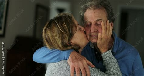 foto de senior wife kissing husband older couple love and affection do stock adobe stock