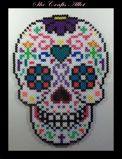 Free skull and bones teardrop halloween brick stitch seed bead earring, necklace, or bracelet pendant pattern. Perler Bead, Colorful Sugar Skull Pattern. Halloween ...