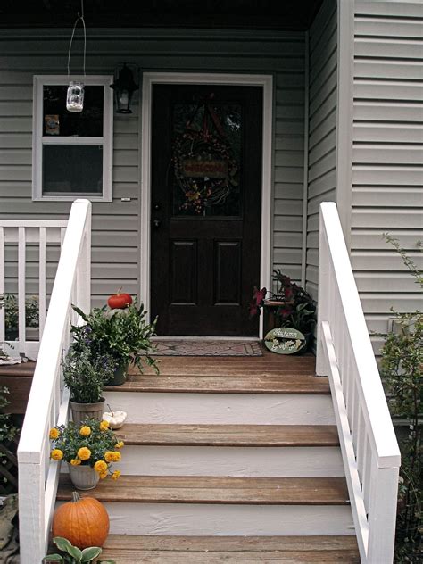 25 front porch decorating ideas to make your entry more inviting #1 // think style and comfort for front porch seating it can be hard to find porch chairs that are both attractive and relaxing to sit in. Deck Stain Color Ideas | Front porch steps, Porch steps ...