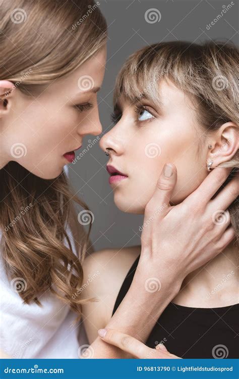 Sensual Lesbian Couple Emracing And Looking On Eath Other Stock Photo