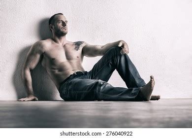 Man Posing Shirtless Leaning On White Stock Photo Shutterstock