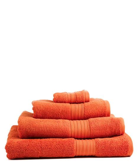 Be it wall color and flooring, or towels and accessories orange flowers next to the sink or on a windowsill can make a nice, simple addition to your bathroom. burnt orange bathroom accessories - Google Search | Orange ...