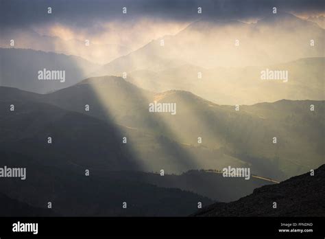 View From The Wildstrubel Hut On Sunrays And Clouds Over Mountains And