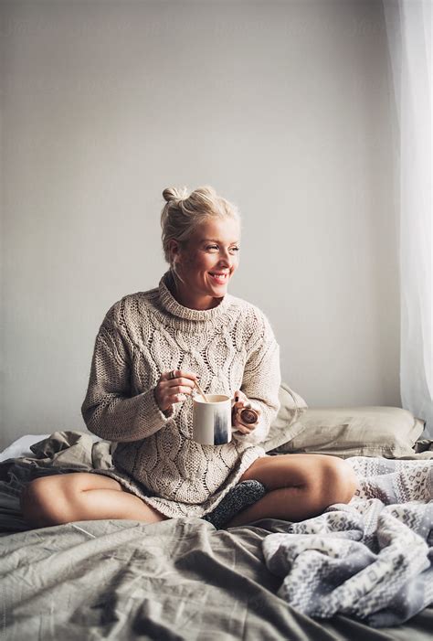 Smiling Woman Drinking Coffee In Bed By Stocksy Contributor Lumina Stocksy