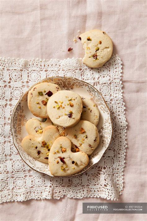 Cookies With Pistachios And Dried Rose Petals — Top View Overhead