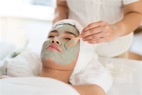 A Female Therapist Doing Facial Spatreatment Add Moisture To Th Stock Image Image Of Asian