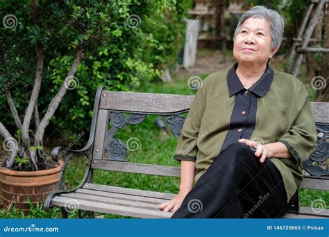 Old Elder Woman Resting In Park Elderly Female Relaxing Outdoors