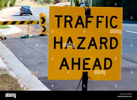 Road Sign Warning Hazard Ahead High Resolution Stock Photography And