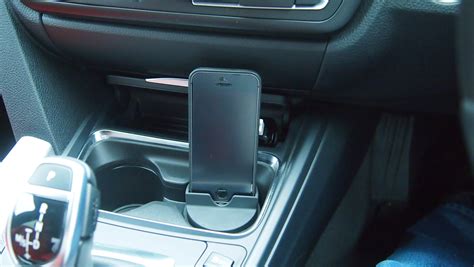 The process is fairly simple and takes under 10 minutes if you are not recording and trying to remove it all at the same time. Cup holder iPhone dock