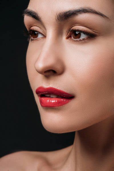 Young Woman With Red Lips — Stock Photo © Arturverkhovetskiy 168580538