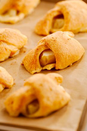 Bring up the two remaining corners, and seal. Paula Deen: Crescent Roll Apple Dumplings Recipe - Serves 15