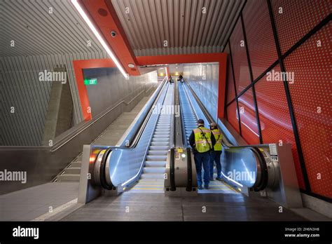 Sound Transit Employees Ascend The Escalator At The New Link Light Rail