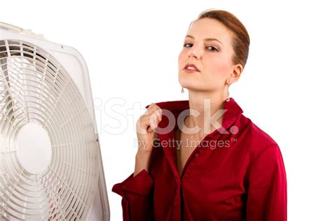Businesswoman Cooling Off With A Fan Stock Photo Royalty Free