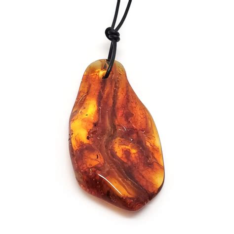 Amber Freeform Drilled Pendant The Fossil Cartel